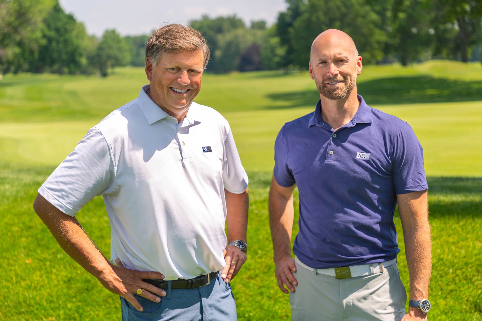 AP Professionals Rochester Founder Mark Pautler and President Matt Taylor on a golf course in Rochester, NY